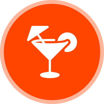 Cocktail glass icon with umbrella and garnish.